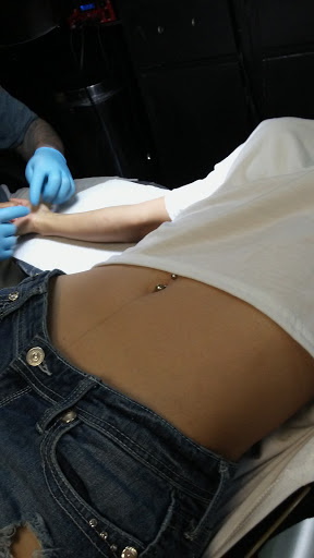 Tattoo Shop «Tan the Man Tattoo & Body», reviews and photos, 6871 S Gessner Rd, Houston, TX 77036, USA