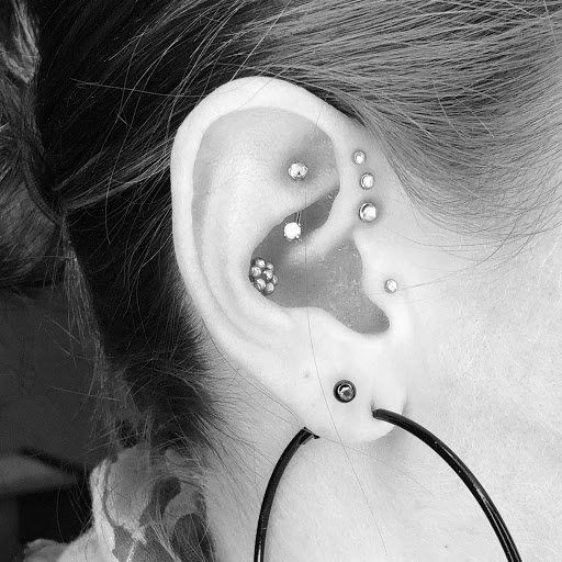 Find best travel tattoo ideas for your next unique tattoo in Davenport at Zeitgeist Piercing & Jewelry