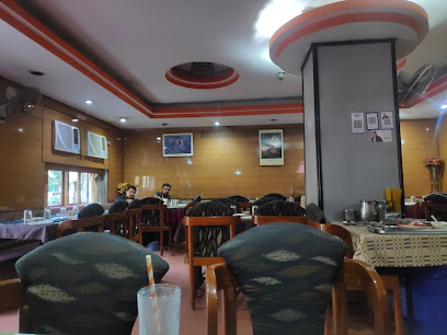 Hot and More Restaurant - 7RX2+9GF, Jawahar Rd, Near Jubilee Garden, Panchnath Plot, Sadar, Rajkot, Gujarat 360001, India