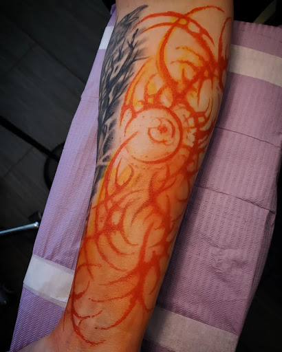 Explore mother and daughter matching tattoos ideas, creative tattoo ideas in Palm Harbor, available at Angry Owl Tattoo and Piercing