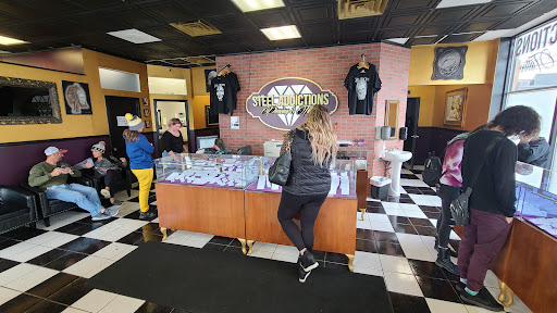 Explore dolphin tattoo ideas for females, creative tattoo ideas in Toledo, available at Steel Addictions