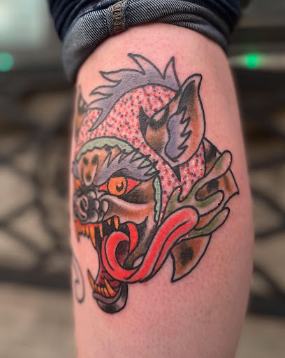 Find small tattoo between breast ideas for your next unique tattoo in Lake Villa at Eternal Tiger Tattoo