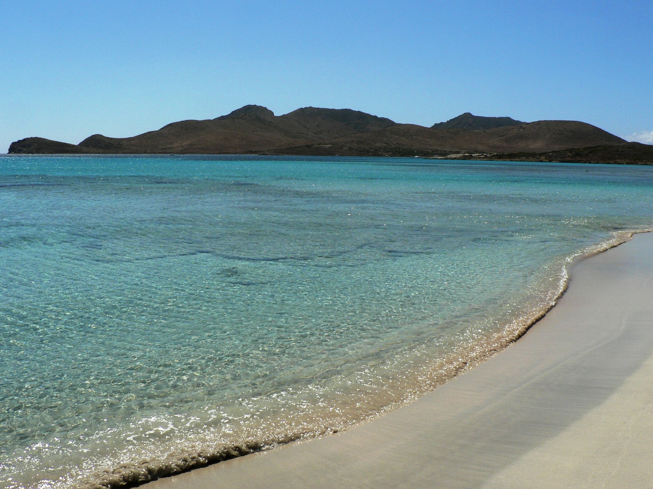 Fotografija Saffron Port z svetel fin pesek površino