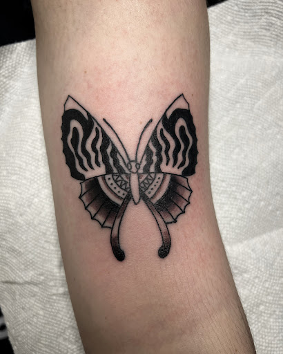 Explore roman numerals tattoo ideas, creative tattoo ideas in Winter Park, available at Forged Empire Tattoo Studio