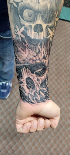 Explore deer tattoo ideas, creative tattoo ideas in Angola, available at Hoodlum Ink