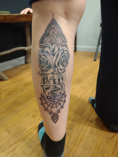 Explore twin sister tattoo ideas, creative tattoo ideas in Williamston, available at Inkd Tattoo Parlor