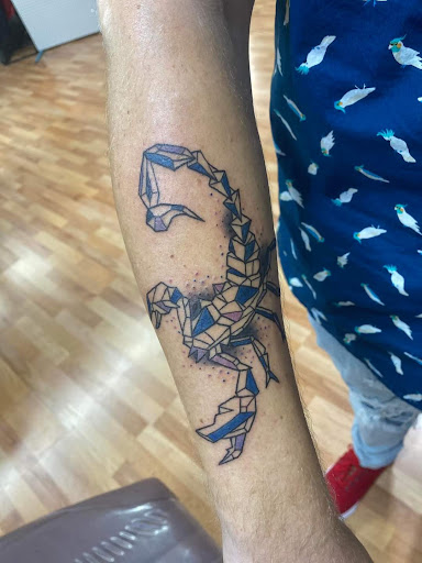 Explore shoulder scar tattoo ideas, creative tattoo ideas in Benton, available at Spectrum Tattoo