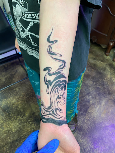 Explore facial tattoo ideas, creative tattoo ideas in Topeka, available at Looking Glass Tattoo & Gallery