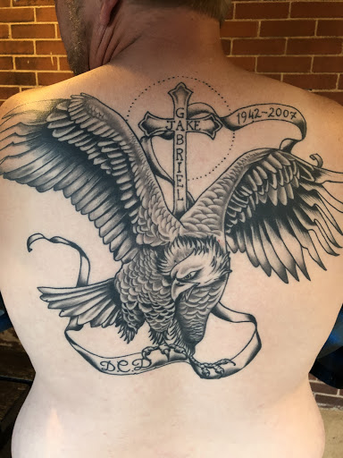 Explore barbed wire tattoo ideas, creative tattoo ideas in Ironwood, available at Iron Ink Tattoos