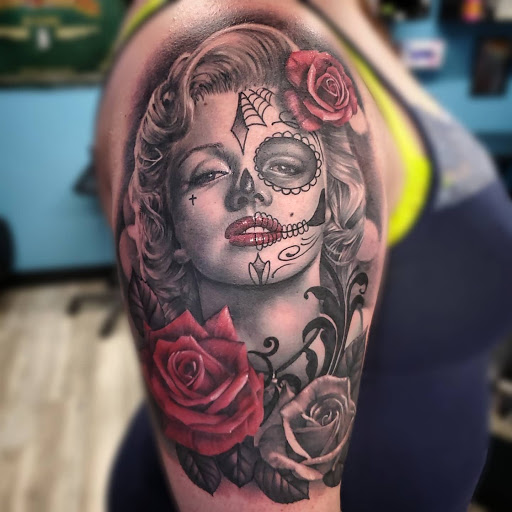 Explore tattoo on leg ideas, creative tattoo ideas in Utica, available at Watchtower Tattoo Company