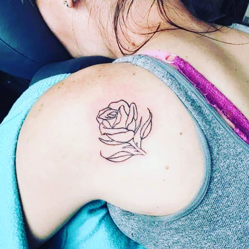 Explore small chest tattoo ideas for men, creative tattoo ideas in Windsor, available at Spillen Ink