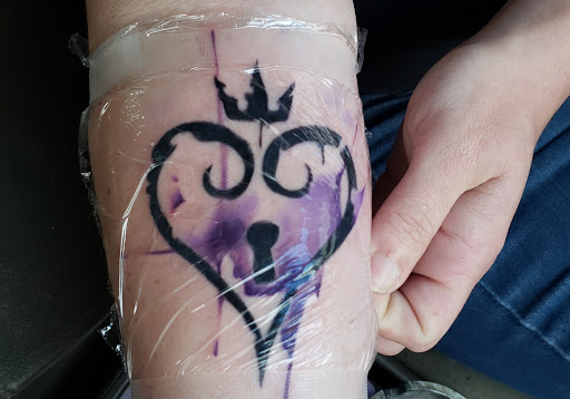 Explore beauty and beast tattoo ideas, creative tattoo ideas in Maysville, available at Silver Muse Tattoo Studio