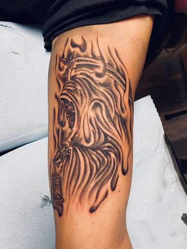 Explore hand tattoo ideas for man, creative tattoo ideas in Warner Robins, available at Untold Pain Tattoo Studio