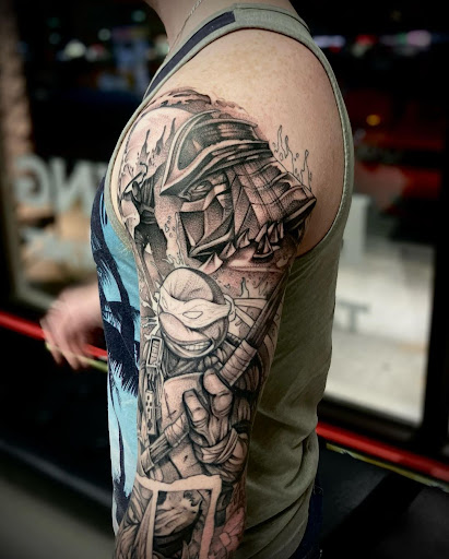 Explore koi fish sleeve tattoo ideas, creative tattoo ideas in Willow Grove, available at Tattoo GalaxyWillow Grove Piercing & Tattoos