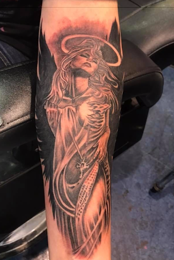 Explore only the strong survive tattoo ideas, creative tattoo ideas in Columbus, available at Infamous Ink Tattoos and Piercings