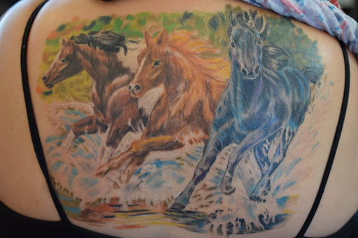 Tattoo Shop «The Shop», reviews and photos, 141 S Grand Ave, Fowlerville, MI 48836, USA