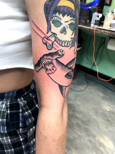 Explore tattoo ideas for behind the ear, creative tattoo ideas in Lake Bluff, available at Evolution Body Arts