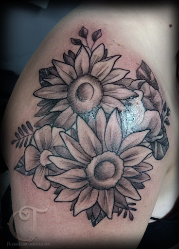 Explore tribal band tattoo ideas, creative tattoo ideas in Houlton, available at Crowes Tattoos