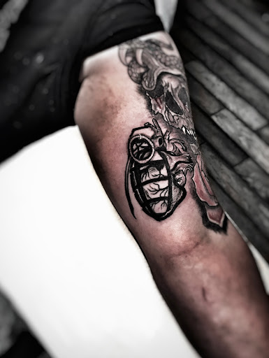 Explore back leg tattoo ideas, creative tattoo ideas in Lavonia, available at 1890 Tattoo Co.