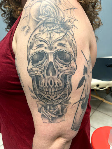 Explore batman logo tattoo ideas, creative tattoo ideas in Morrisville, available at Sinners Circle tattoo co.