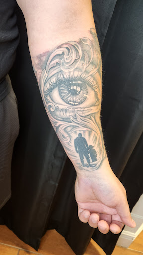 Explore sleeve tattoo ideas male, creative tattoo ideas in Stuart, available at Tiger Shark Tattoo Studio