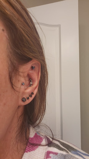 Explore nirvana tattoo ideas, creative tattoo ideas in Albuquerque, available at Sachs Body Modification