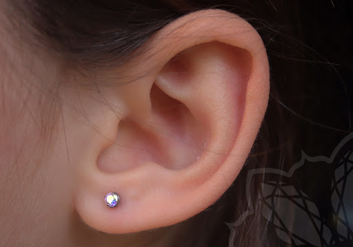 Find low back tattoo ideas for your next unique tattoo in Honolulu at Honolulu Piercing Company at Skin Deep Tattoo Waikiki