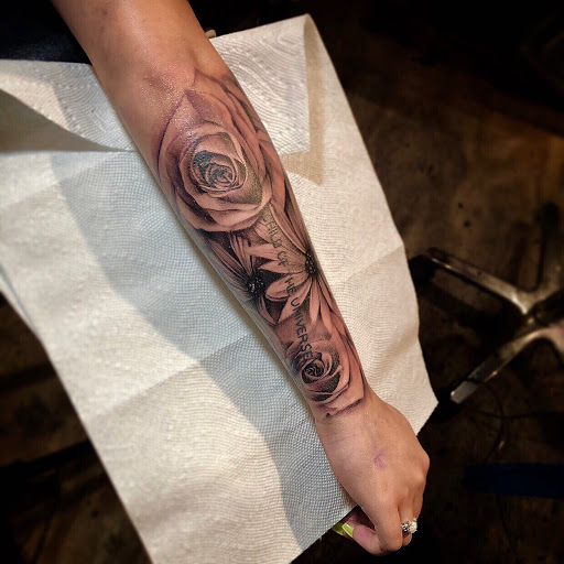 Explore thigh cover up tattoo ideas, creative tattoo ideas in Peoria, available at InkCapital Tattoos