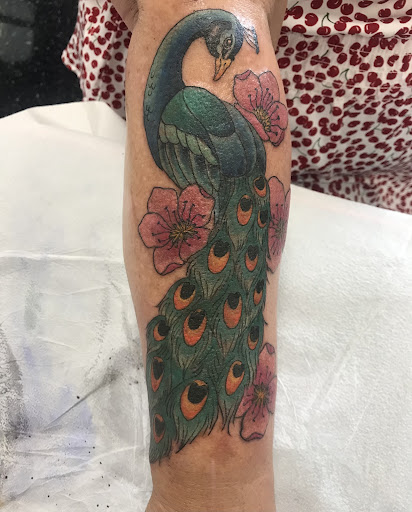 Explore small face tattoo ideas, creative tattoo ideas in Lincoln, available at Iron Brush Tattoo