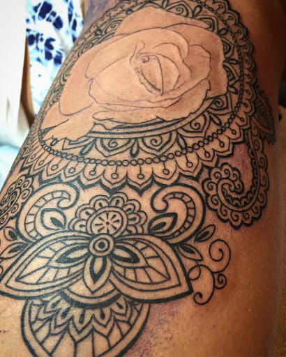 Explore barbed wire tattoo ideas, creative tattoo ideas in Peoria, available at Iron Key Tattoo Studio Inc.