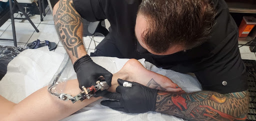 Explore army tattoo ideas for men, creative tattoo ideas in Englewood, available at Phantom 8 Tattoo & Piercing