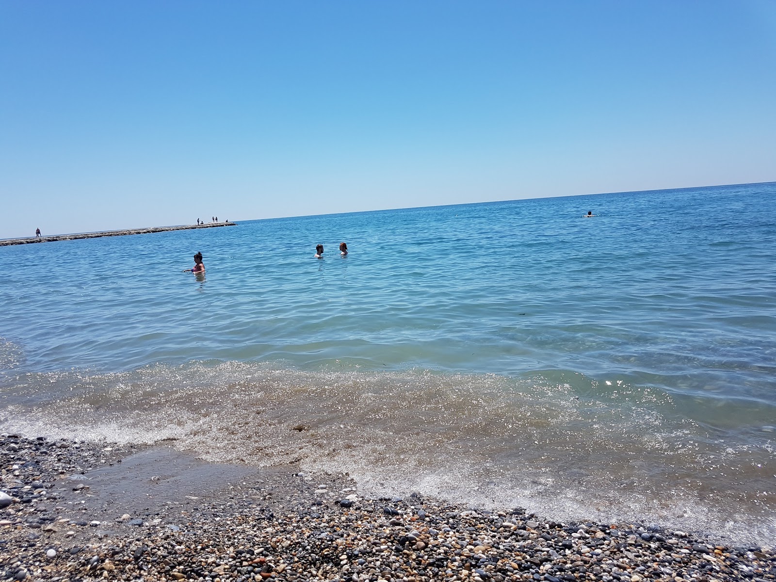 Foto von Turkler beach II und die siedlung
