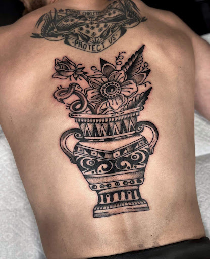Explore back arm tattoo ideas, creative tattoo ideas in Rowlett, available at Fresh Image Tattoo Studios
