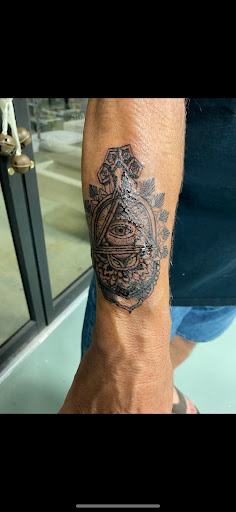 Explore mens armband tattoo ideas, creative tattoo ideas in Youngsville, available at Inkophilia