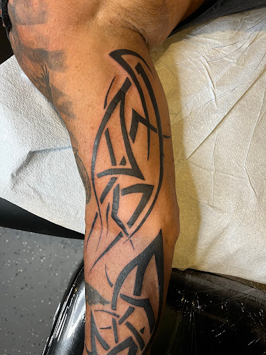 Explore shaded sleeve tattoo ideas, creative tattoo ideas in Myrtle Beach, available at Elite Ink Tattoos of Myrtle Beach