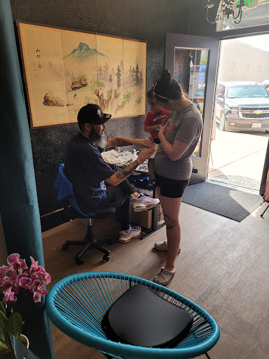 Explore purple tattoo ideas, creative tattoo ideas in Hillsboro, available at Reflections Art Gallery and Studio