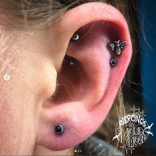 Explore chess piece tattoo ideas, creative tattoo ideas in Oshkosh, available at Piercings by Molly Moon at 920 Tattoo and Piercing
