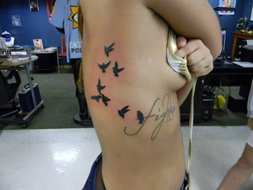 Explore tattoo ideas for family symbol, creative tattoo ideas in Rockford, available at House Of Pain Tattoo co.