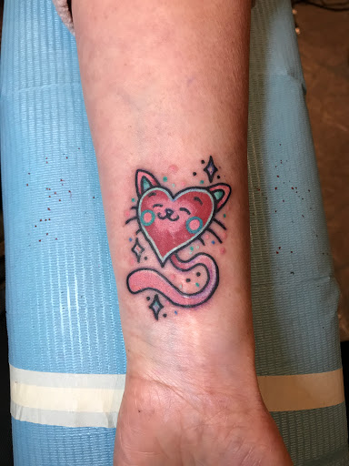 Explore hip tattoo ideas for women, creative tattoo ideas in Milford, available at Golden Hammer Tattoo Studios