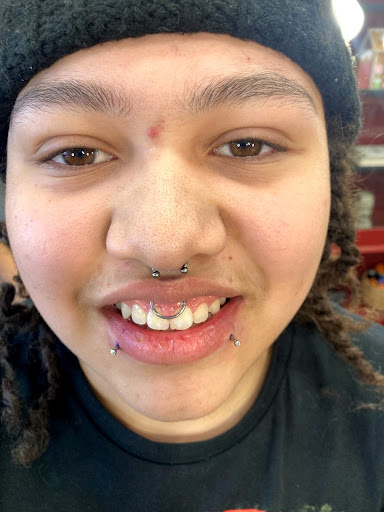 Explore neck tattoo ideas woman, creative tattoo ideas in Yakima, available at Wallflower Body Piercing & Crazy Ink Tattoo