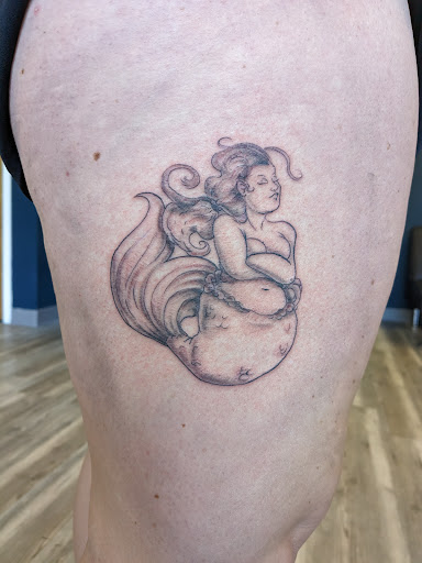 Explore tattoo scroll ideas, creative tattoo ideas in East Rochester, available at Spice City Tattoo