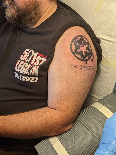 Explore tattoo ideas for back of the neck, creative tattoo ideas in Omaha, available at Liquid Courage Tattoos