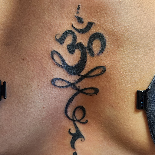 Explore safety pin tattoo ideas, creative tattoo ideas in Augusta, available at Mr. Tattoo