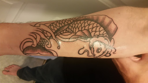 Explore ted lasso tattoo ideas, creative tattoo ideas in Eureka Springs, available at Sailors Luck Tattoo