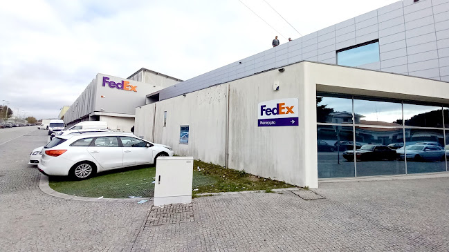 TNT - FedEx Express - Loja de motocicletas