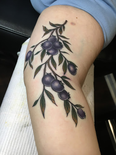 Explore cross with names tattoo ideas, creative tattoo ideas in Savannah, available at Riverside Tattoo Parlor