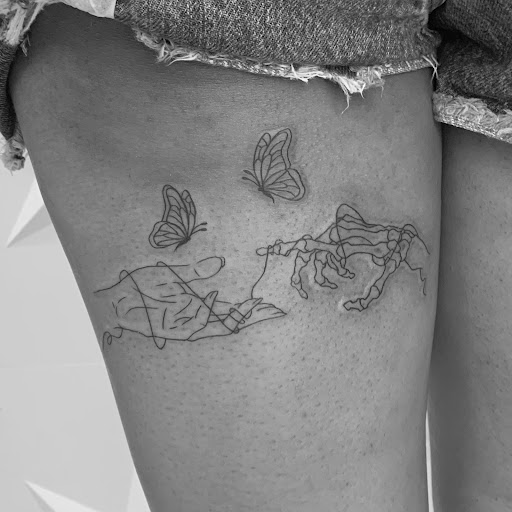 Explore neck tattoo ideas for men, creative tattoo ideas in Fairfax, available at Pinky Inky Tattoo