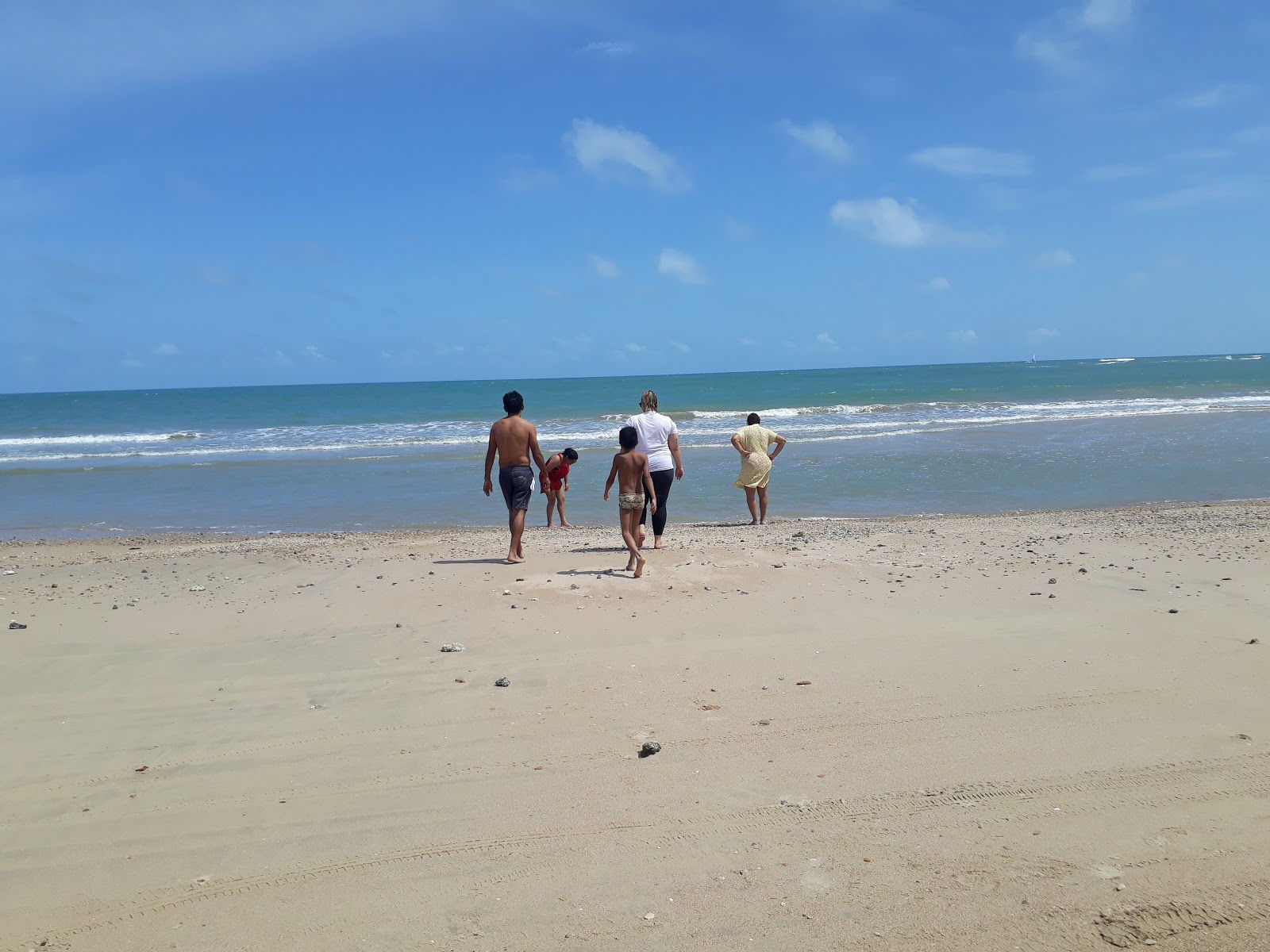 Fotografie cu Praia de Caetanos cu o suprafață de apa pură turcoaz