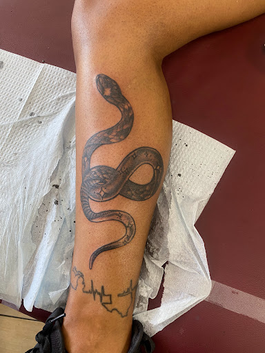 Explore tattoo ideas for sons, creative tattoo ideas in Houston, available at Orlandos Tattoo Studio