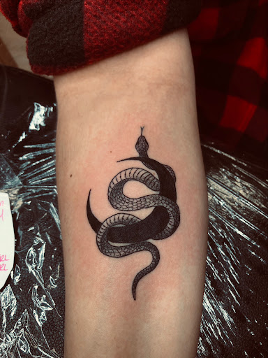 Explore lone wolf tattoo ideas, creative tattoo ideas in North Tonawanda, available at Dark Side Ink Tattoo Studio